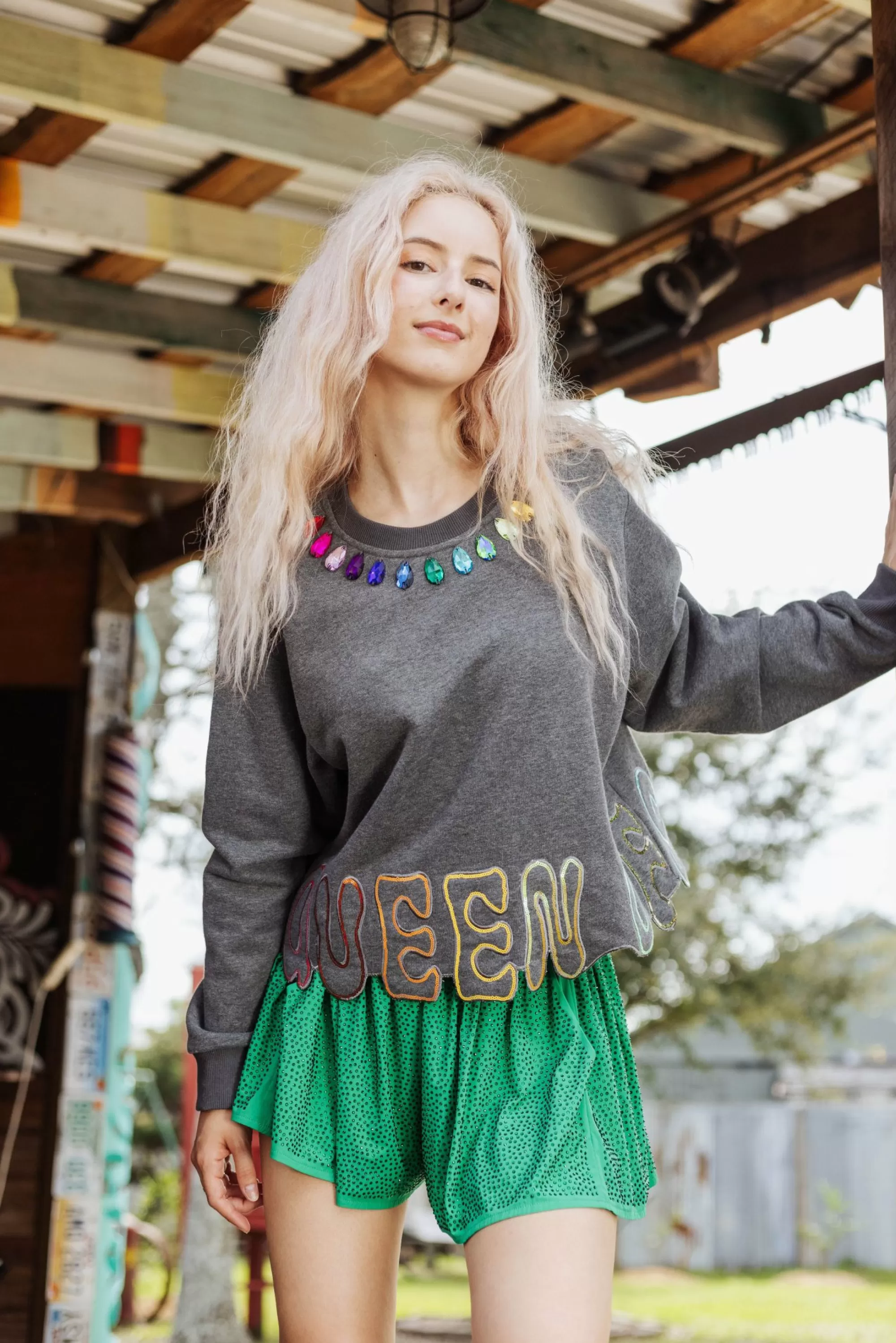 Queen Of Sparkles Cutout Bottom Sweatshirt